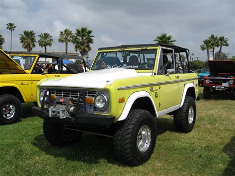 Two Tone Yellow Ford Bronco Early Off Road Small Suv With White Hood