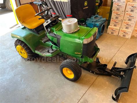 John Deere 325 Tractor Wplow Allsurplus