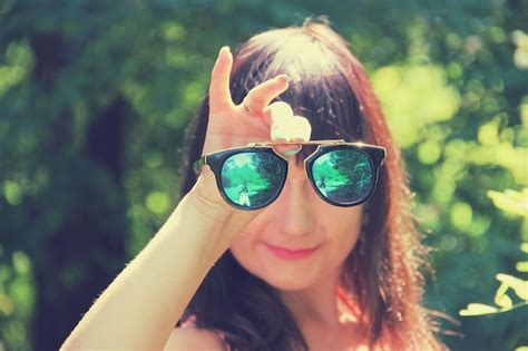 Premium Photo Close Up Portrait Of Woman Wearing Sunglasses