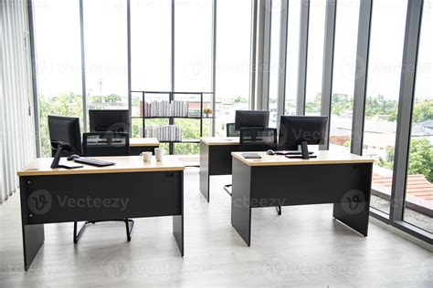 Modern Office Interior Design With Table Computer Monitor Notebook And