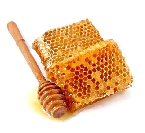 Premium Photo Honey Dipper With Honeycomb