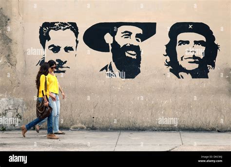 cuban women walking  graffiti  heroes   revolution including