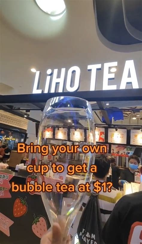 Woman Fills Large Wine Glasses With S Liho Tea Contents Shared Among