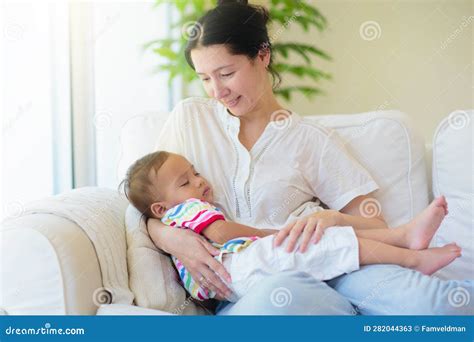 Ape Breastfeeding Infant In Thailand Macaca Leonina Northern Pig