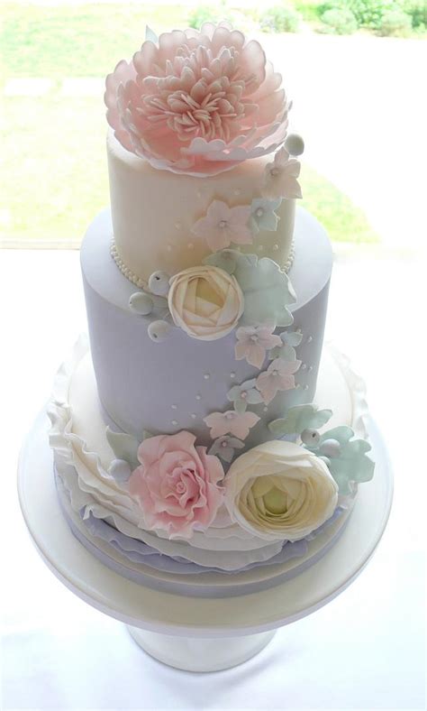 Pale blue and feature peony Wedding Cake. - Decorated - CakesDecor