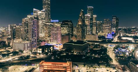 Night Cityscape with Illuminated Skyscrapers · Free Stock Photo