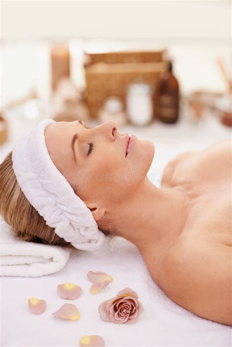 Sometimes The Beauty Spa Is All You Need A Woman In A Day Spa Relaxing On A Massage Table