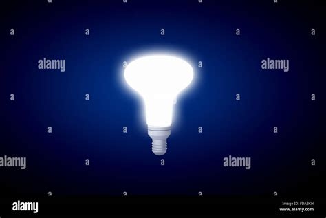 Glowing Inverted Light Bulb On Dark Background Stock Photo Alamy