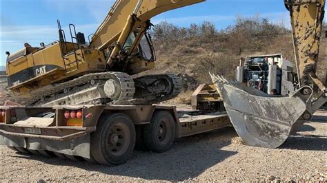 Loading And Transporting On Site The Caterpillar 365c Excavator