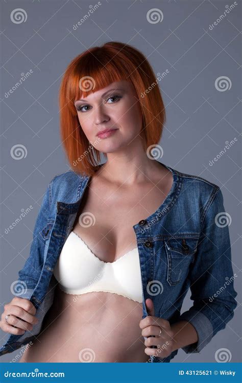 Hot Redhead Girl Posing In Seamless Bra And Jacket Stock Image Image