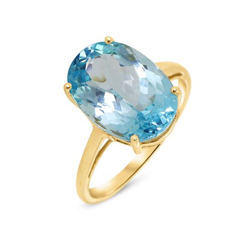 Bague Or Jaune Topaze Bleue Ovale X Mm Ref