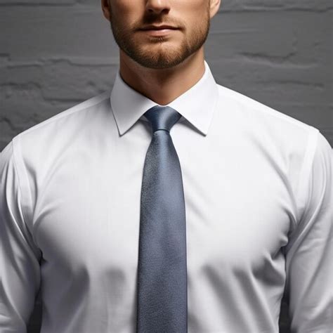 Premium AI Image A Man Wearing A White Shirt With A Blue Tie