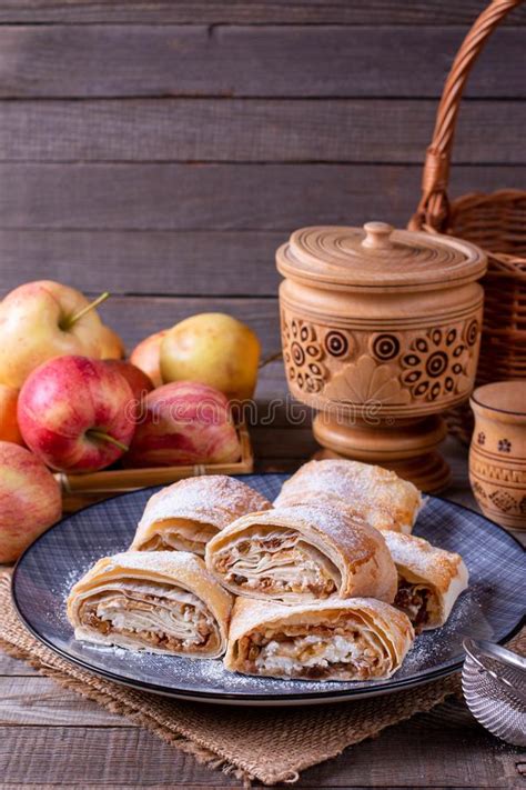 Pieces Of Apple Homemade Strudel With Powdered Sugar Stock Photo