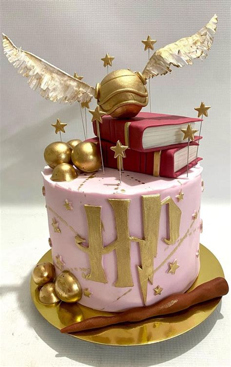 30 Harry Potter Birthday Cake Ideas : Soft Pink Cake Topped with Red Spell Books