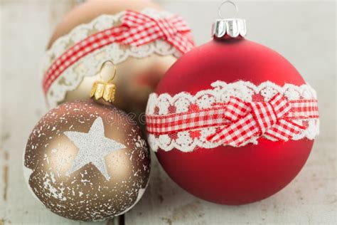 Three Christmas Baubles On Rustic Wood Stock Photo Image Of Season