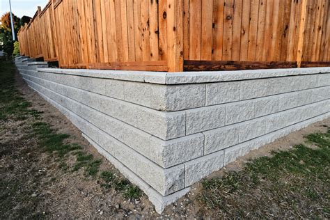 Should You Add A Fence To A Retaining Wall? [And How To Do So]