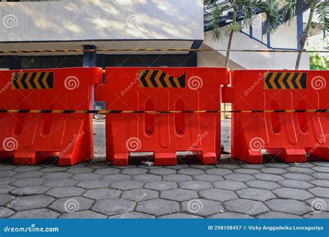 Three Water Barriers in Front of a Building Stock Image - Image of ...