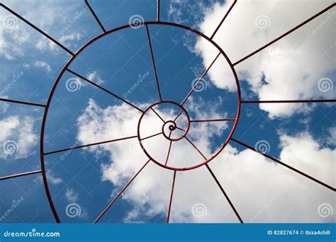 Fibonacci Metal Structure With The Sky In The Background Stock Photo