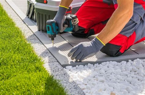 Premium Photo Professional Worker Installing Poolside Composite