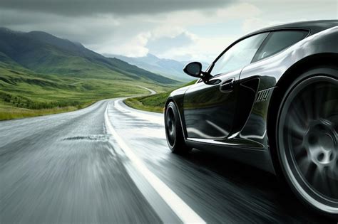 Sports car on the road wallpaper | Premium AI-generated image