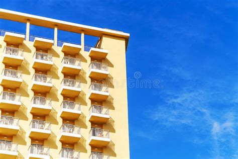 Hotel Room Balconies in Modern Building. Geometric Pattern of Balcony Against Blue Sky ...