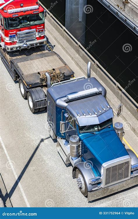 Powerful Blue Big Rig Classic Semi Truck Tractor Transporting Fire