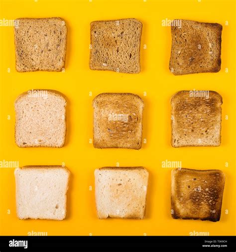 Different types of toast bread and various toasts in a toaster on a ...