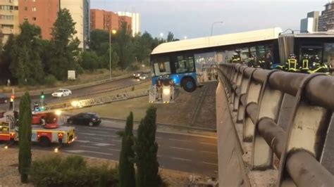 Bus Left Hanging Off The Edge Of A Bridge In Madrid Crash Video — Rt