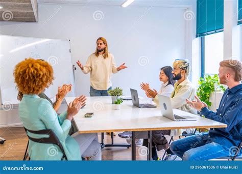Colleagues Congratulating a Man after the Presentation of a Project ...