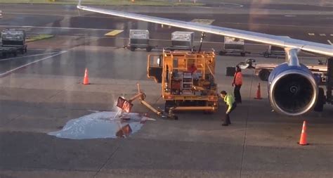 Airport Workers Oblivious As Fuel Spills Onto Runway Videos — Rt World News