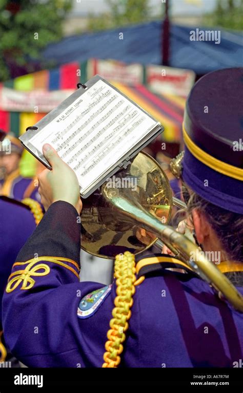 trombone player marching band sheet music Stock Photo - Alamy