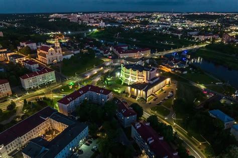 Premium Photo | Aerial night panorama overlooking old town urban ...