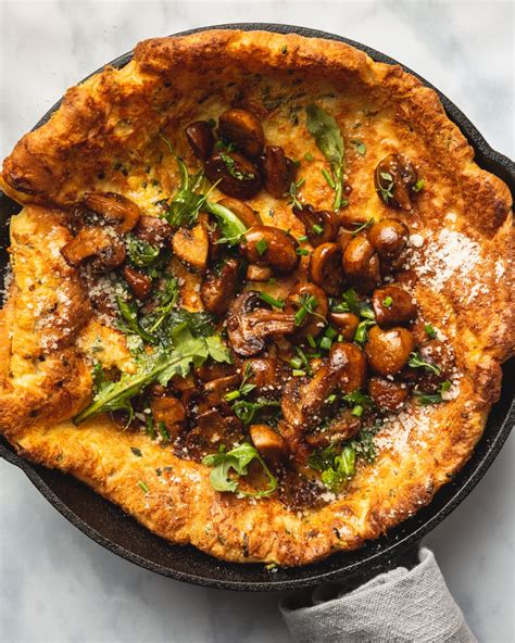 This Savory Parmesan Herb Dutch Baby Is Topped With Garlic Butter