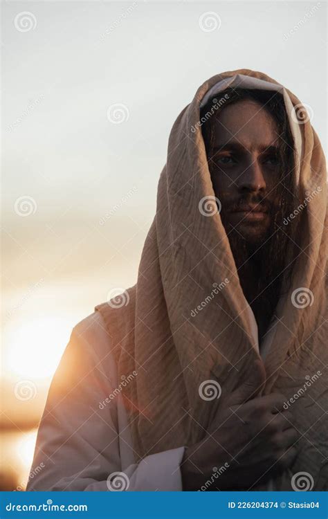 Portrait Of Jesus Christ In White Robe At Sunset Stock Photo Image Of