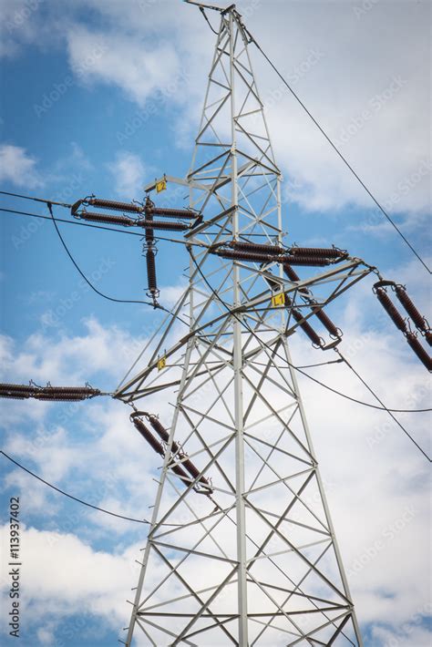 High Voltage Electric Pole With Wires Line Of Electricity