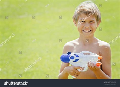 205 Boy Play Watergun Images, Stock Photos & Vectors | Shutterstock