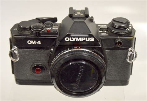 Olympus Om 4 35mm Slr Camera Body Only Surplus Trading Corporation