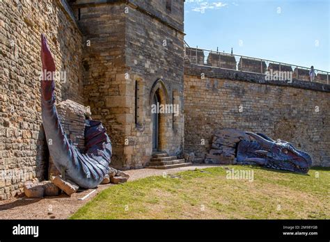 Lucy The Dragon Breaking Through A Wall Of Lincoln Castle Stock Photo