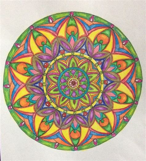 A Drawing Of A Colorful Flower In The Middle Of A White Paper With