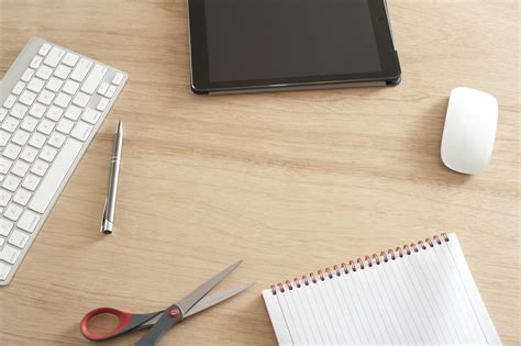 Free Stock Photo 11907 Desk with Scattered Office Supplies and Copy