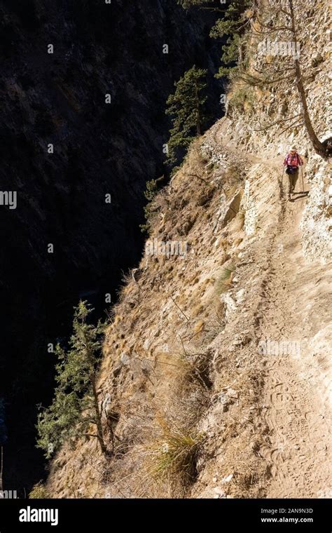 Female Trekker On A Precipitous Trail On The Lower Dolpo Trek In The