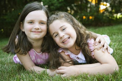 Girls smiling in grass Free Photo Download | FreeImages