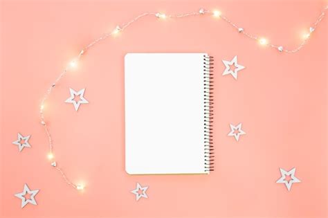 Free Photo Blank Notepad On Pink Background And Decorative Stars And