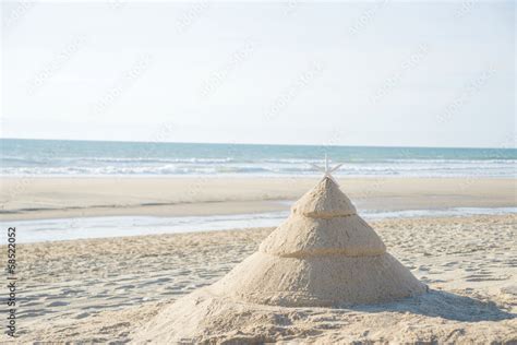 Christmas tree on beach Stock Photo | Adobe Stock