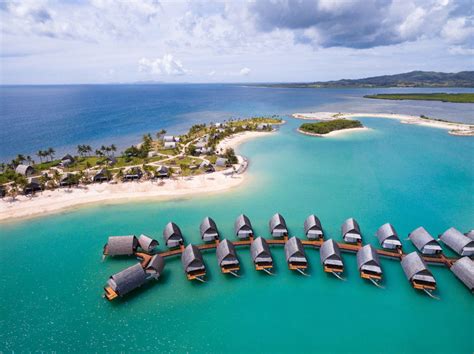 Over water bungalows and villas on the water in Fiji.