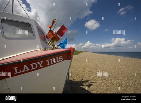 Fishing Boats Hauled Up On Weybourne Beach Norfolk Stock Photo Alamy