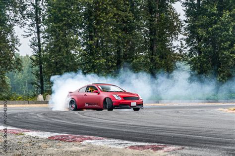 Red Drift Car Race Car Drifting Around Corner Very Fast With Lots Of