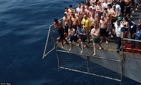 Us Navy Sailors Leap From Ships Around The World During Swim Call