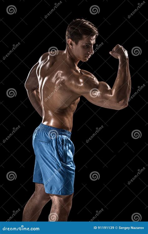 Strong Athletic Man Fitness Model Posing Back Muscles Triceps Over Black Background Stock Image