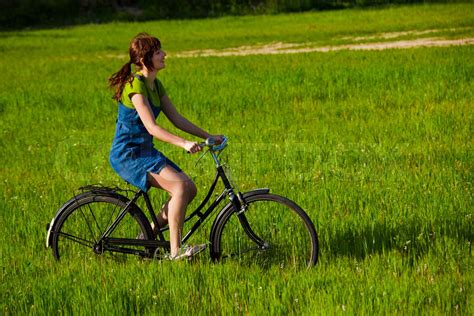 Riding A Bicycle Stock Image Colourbox